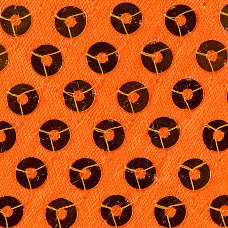 Bright orange paillette texture background.の写真素材