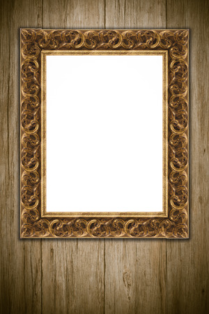 Old picture frame on vintage wood wall.の写真素材