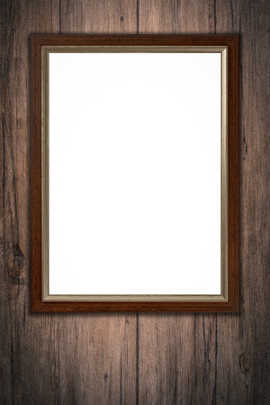 Old picture frame on vintage wood wall.の写真素材