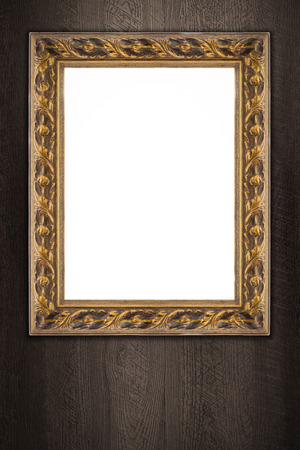 Old picture frame on vintage wood wall.の写真素材