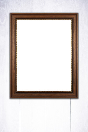 Old picture frame on vintage wood wall.の写真素材