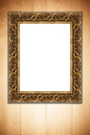 Old picture frame on vintage wood wall.の写真素材