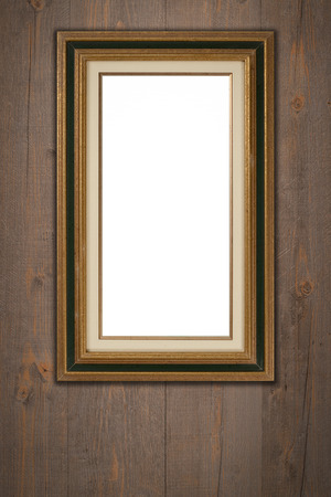 Old picture frame on vintage wood wall.の写真素材