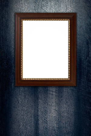 Old picture frame on vintage wood wall.の写真素材