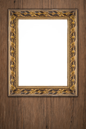 Old picture frame on vintage wood wall.の写真素材