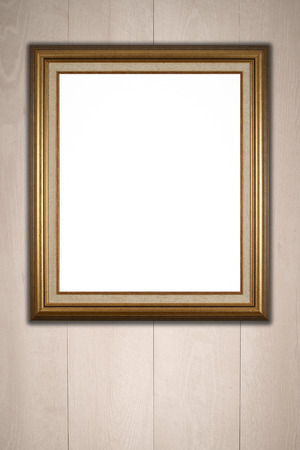 Old picture frame on vintage wood wall.の写真素材