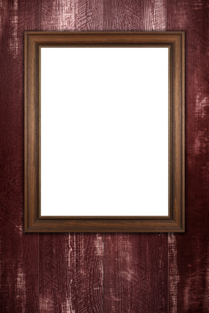 Old picture frame on vintage wood wall.の写真素材
