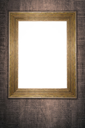 Old picture frame on vintage wood wall.の写真素材