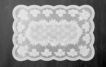 Retro place mat on black chalkboard texture.の写真素材