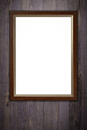 Old picture frame on vintage wood wall.の写真素材