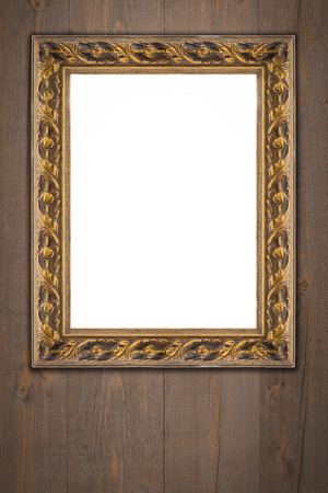 Old picture frame on vintage wood wall.の写真素材