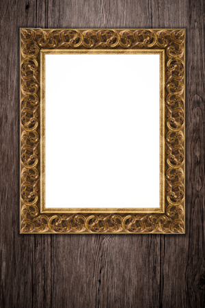 Old picture frame on vintage wood wall.の写真素材