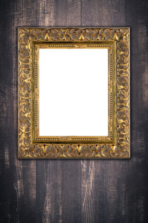 Old picture frame on vintage wood wall.の写真素材