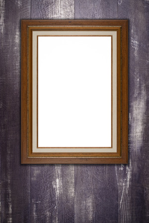 Old picture frame on vintage wood wall.の写真素材
