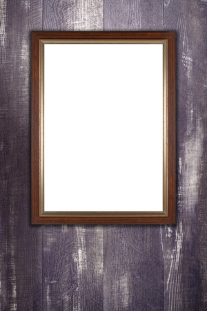 Old picture frame on vintage wood wall.の写真素材