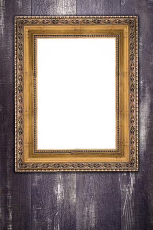Old picture frame on vintage wood wall.の写真素材