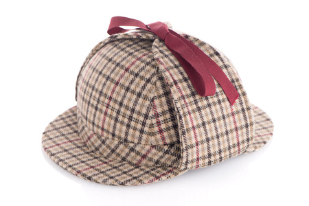 British Deerhunter or Sherlock Holmes cap on white background.の写真素材