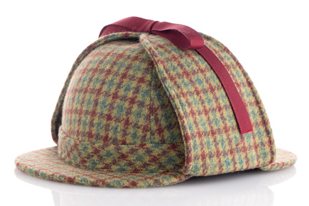 British Deerhunter or Sherlock Holmes cap on white background.の写真素材