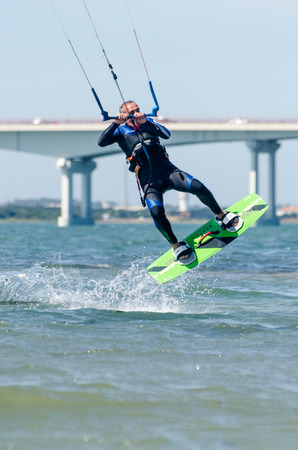 ILHAVO, PORTUGAL - MAY 17, 2015: Francisco Costa kitesurfing during the Festival do Vento.のeditorial素材