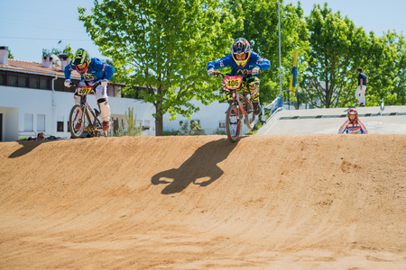 ESTARREJA, PORTUGAL - MAY 16, 2015: Marco Albano followed by Goncalo Duarte during the Taca de Portugal Bmx.のeditorial素材
