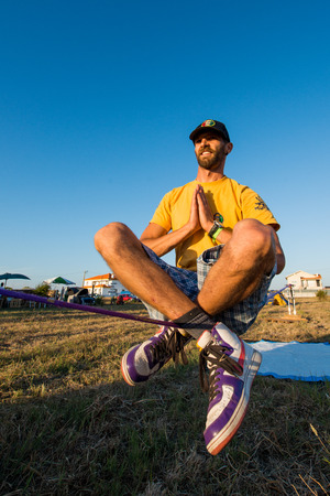 ILHAVO, PORTUGAL - JULY 24, 2015: Andre antunes Slackline performance during the Festival de Verao...