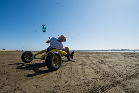 ILHAVO, PORTUGAL - JULY 24, 2015: Ralph Irner riding a kitebuggy during the Festival de Verao na Riaのeditorial素材