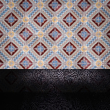 Empty wood table top and blur vintage ceramic tile pattern wall in background, Mock up template for display of your product.の写真素材