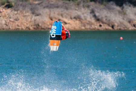 FERREIRA DO ZEZERE, PORTUGAL - SEPTEMBER 19, 2015: Tyler Higham USA during the WWA Supra World Wakeboard Championship 2015 in Ferreira do Zezere, Portugal.のeditorial素材