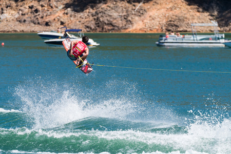 FERREIRA DO ZEZERE, PORTUGAL - SEPTEMBER 19, 2015: Austin Hair (USA) during the WWA Supra World Wakeboard Championship 2015 in Ferreira do Zezere, Portugal.のeditorial素材