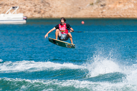 FERREIRA DO ZEZERE, PORTUGAL - SEPTEMBER 19, 2015: Brian Grubb (USA) during the WWA Supra World Wakeboard Championship 2015 in Ferreira do Zezere, Portugal.のeditorial素材