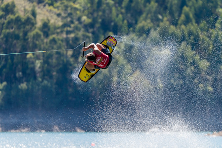 FERREIRA DO ZEZERE, PORTUGAL - SEPTEMBER 19, 2015: Cory Teunissen (AUS) during the WWA Supra World Wakeboard Championship 2015 in Ferreira do Zezere, Portugal.のeditorial素材