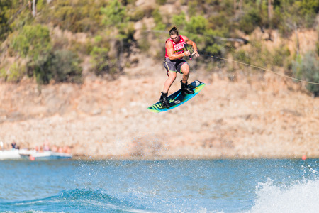FERREIRA DO ZEZERE, PORTUGAL - SEPTEMBER 19, 2015: Tony Lacconi (AUS) during the WWA Supra World Wakeboard Championship 2015 in Ferreira do Zezere, Portugal.のeditorial素材