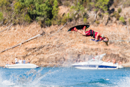 FERREIRA DO ZEZERE, PORTUGAL - SEPTEMBER 19, 2015: Noah Flegel (USA) during the WWA Supra World Wakeboard Championship 2015 in Ferreira do Zezere, Portugal.のeditorial素材
