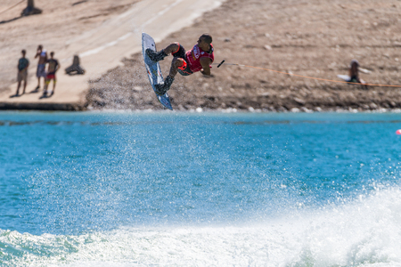 FERREIRA DO ZEZERE, PORTUGAL - SEPTEMBER 19, 2015: Dean Smith (AUS) during the WWA Supra World Wakeboard Championship 2015 in Ferreira do Zezere, Portugal.のeditorial素材