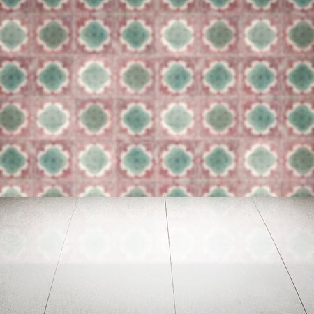 Empty wood table top and blur vintage ceramic tile pattern wall in background, Mock up template for display of your product.の写真素材