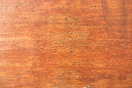 Cracked weathered brown painted wooden board texture.の写真素材