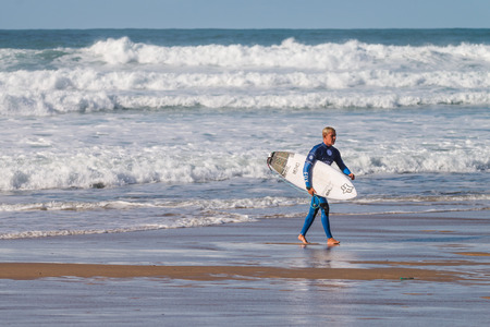 ERICEIRA, PORTUGAL - JANUARY 12, 2015: Dylan Lightfoot ZAF during the 2016 World Junior Championships, Men's Junior Tour 1 at Ribeira D'Ilhas beach - Ericeira, Portugal.のeditorial素材