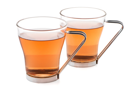 Two glass cups of black tea isolated on white background.の写真素材