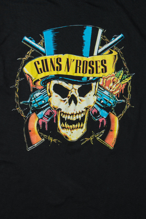 AVEIRO, PORTUGAL - JULY 20, 2016: Guns n' Roses merchandise t-shirt illustration. Guns N' Roses is of the world's best-selling bands of all time. AVEIRO, PORTUGAL - JULY 20, 2016: Guns n' Roses merchandise t-shirt illustration. Guns N' Roses is of the world's best-selling bands of all time.
