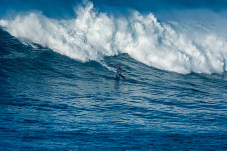 NAZARE, PORTUGAL - DECEMBER 20, 2016: Billy Kemper (HAW) during the Nazare Challenge 2016 - Big Wave...