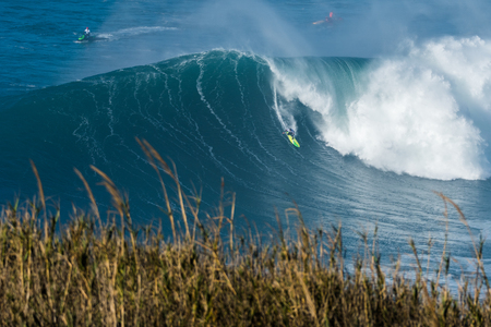 NAZARE, PORTUGAL - DECEMBER 20, 2016: Jamie Mitchell (AUS) during the Nazare Challenge 2016 - Big Wave Tour #3 at Praia do Norte - Nazare, Portugal.のeditorial素材