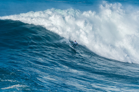 NAZARE, PORTUGAL - DECEMBER 20, 2016: Trevor Carlson (HAW) during the Nazare Challenge 2016 - Big...