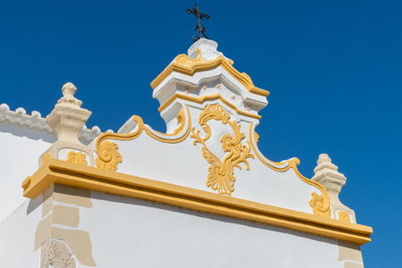 Tower detail of the Sao Salvador Alvor Church Portugal , Algarve.の写真素材