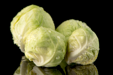 Fresh brussels sprouts isolated on black background.の写真素材