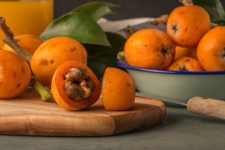 loquats on kitchen counter background.の写真素材