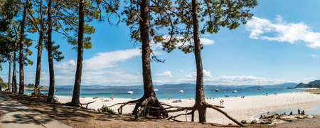 ISLAS CIES, SPAIN - CIRCA SEPTEMBER 2017: Unidentified people relax on the sand beach of Playa de Rodas on the Cies Islands of Spain, included in the Atlantic Islands of Galicia National Park.のeditorial素材
