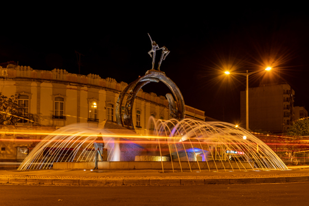 LOULE, PORTUGAL - CIRCA MAY 2018: Water fountain at night in the old town of Loule at the Algarve of Portugal in Europe.のeditorial素材