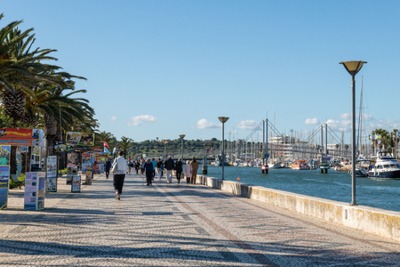 LAGOS, PORTUGAL - CIRCA MAY 2018: Avenida dos Descobrimentos with tourists walking, Lagos, Algarve, Portugal,のeditorial素材