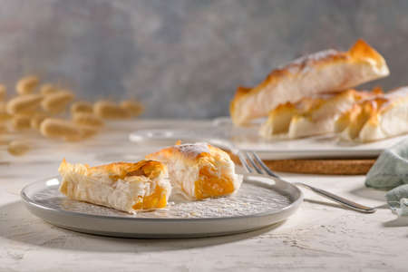 Typical portuguese sweets Pasteis de Vouzela served on countertop.の写真素材