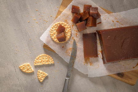 Marmalade in crackers on a kitchen counter.
